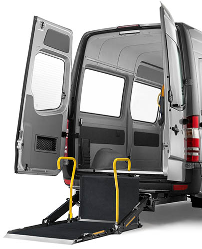 Unfolded and lowered Cassette lift installed on the rear of a van